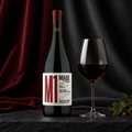 M1 by MABE bottle beside a glass of red wine