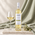 Viero Old Vines by Finca de los Arandinos bottle beside a glass of white wine